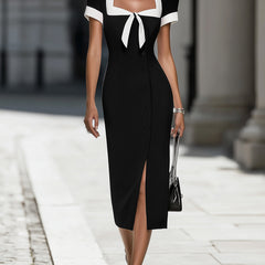 Black and white contrast trim midi dress from My Store, showing a fitted dress with sleek design and stylish trim details.