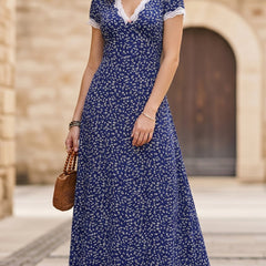 White lace patch floral V-neck maxi dress featuring delicate floral lace details and a flowing silhouette.