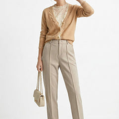 Women's Merino wool tapered trousers, stylish and comfortable pants for women, shown in a natural pose with a neutral background.