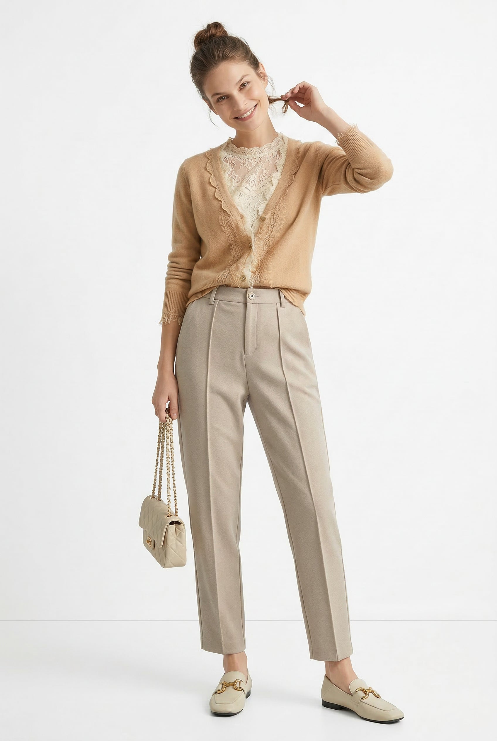 Women's Merino wool tapered trousers, stylish and comfortable pants for women, shown in a natural pose with a neutral background.