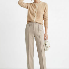 Women's Merino wool tapered trousers, stylish and comfortable pants for women, shown in a natural pose.