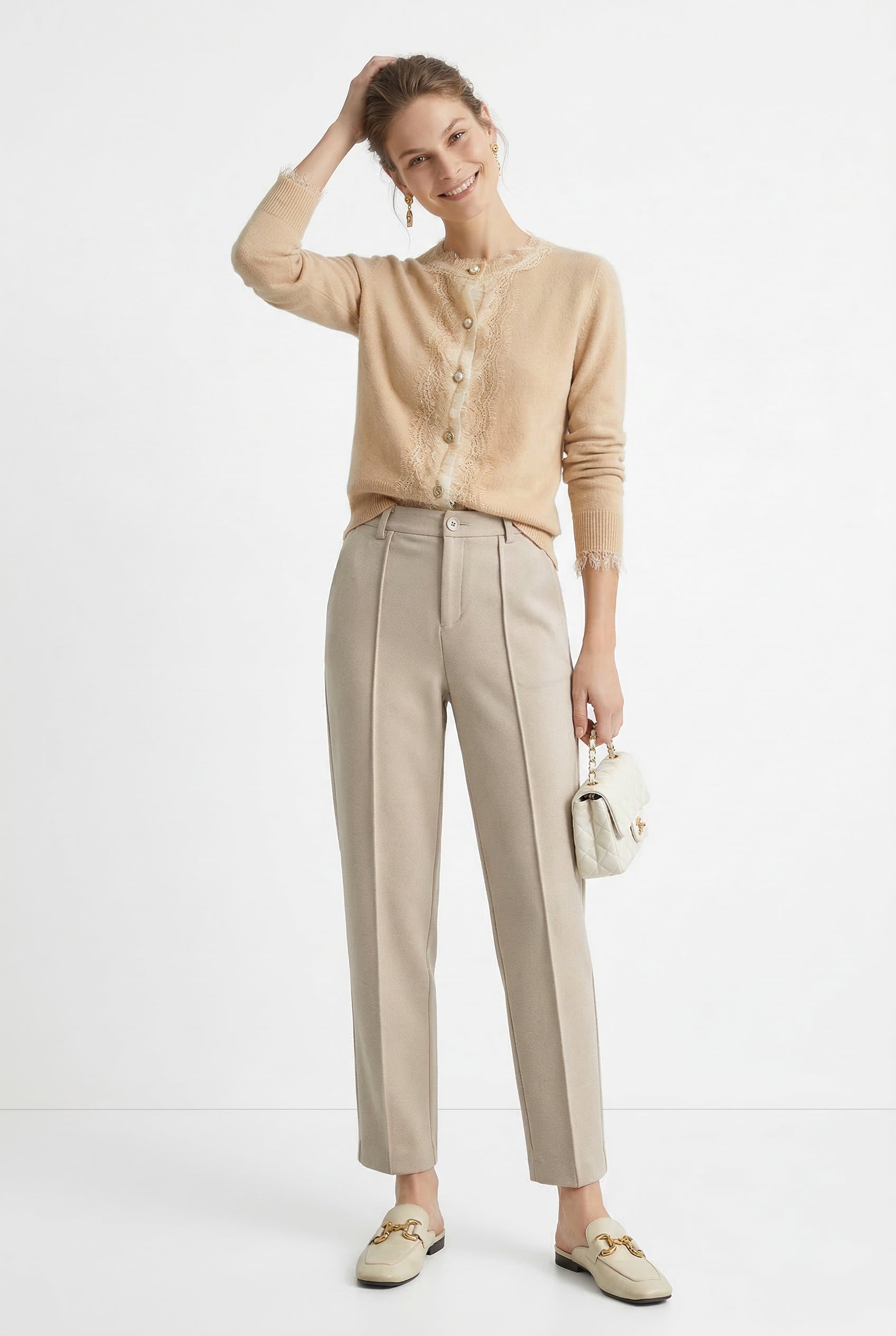 Women's Merino wool tapered trousers, stylish and comfortable pants for women, shown in a natural pose.