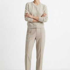 Women's wool tapered trousers in merino wool, stylish and comfortable pants for women, shown in a modern outfit.
