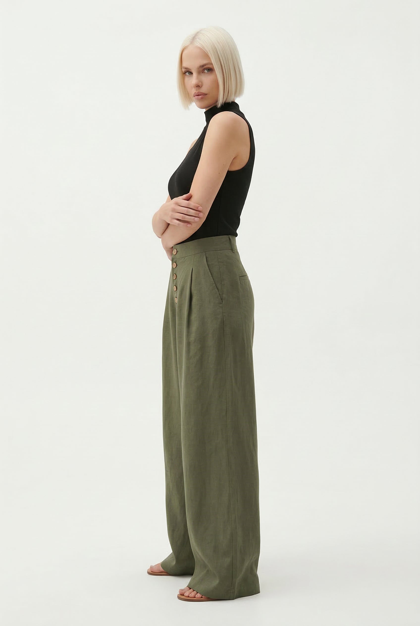 Women’s knit wide-leg elastic-waist trousers in a loose pull-on style, shown in a relaxed, comfortable fit.