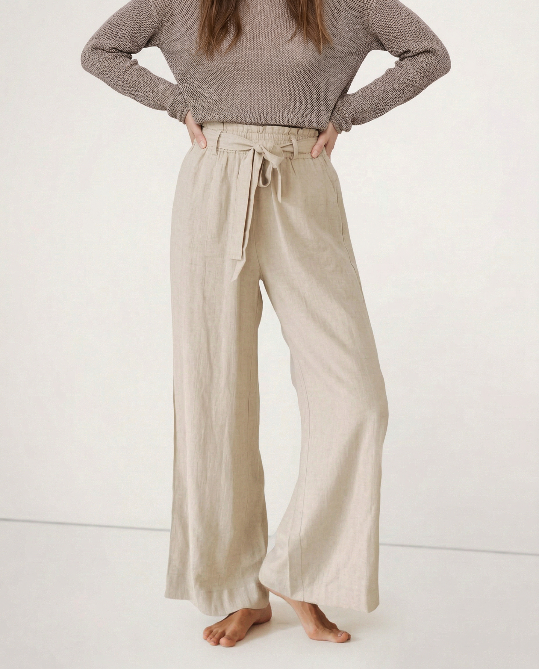 Linen wide-leg trousers for women featuring a loose pull-on design and quality fabric, perfect for casual and comfortable style.