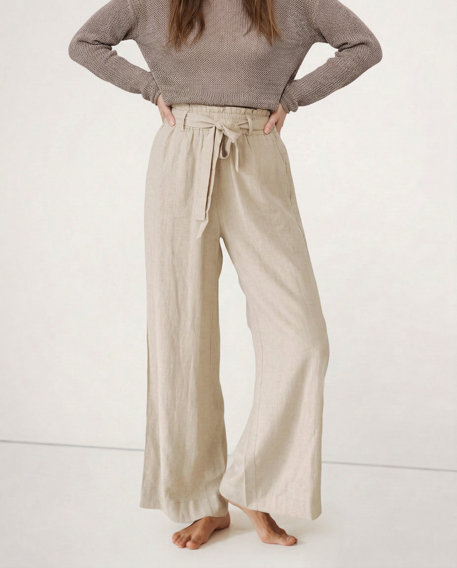 Linen wide-leg trousers for women featuring a loose pull-on design and quality fabric, perfect for casual and comfortable style.