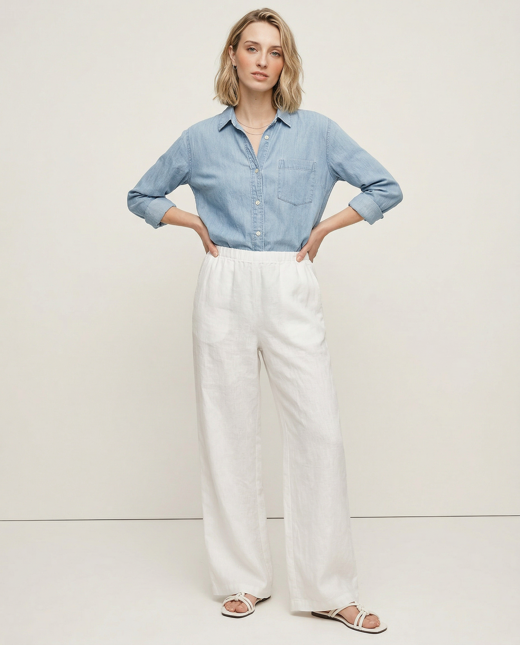 Light beige knit wide-leg drawstring trousers for women, featuring soft fabric and relaxed fit, ideal for casual wear.