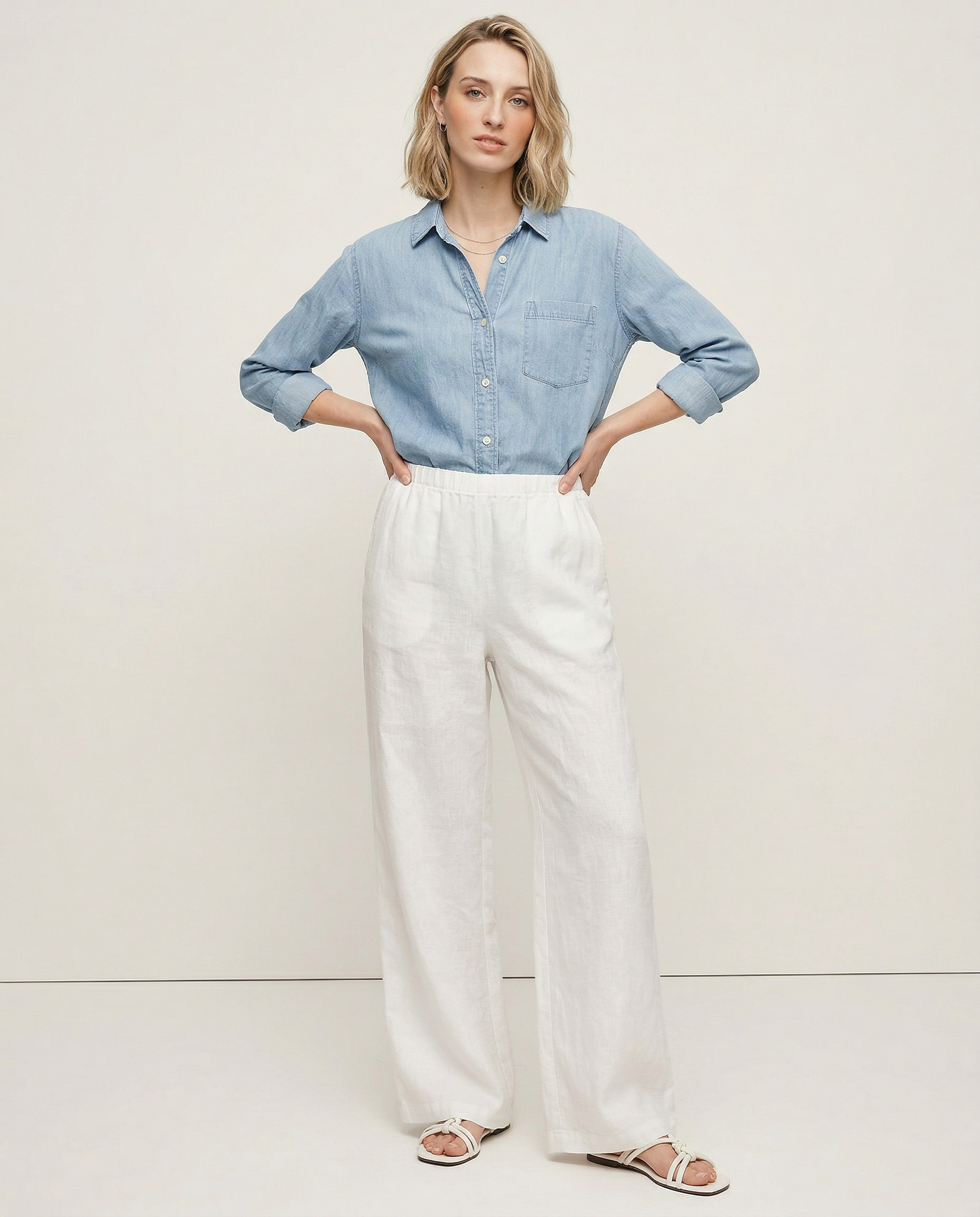 Light beige knit wide-leg drawstring trousers for women, featuring soft fabric and relaxed fit, ideal for casual wear.
