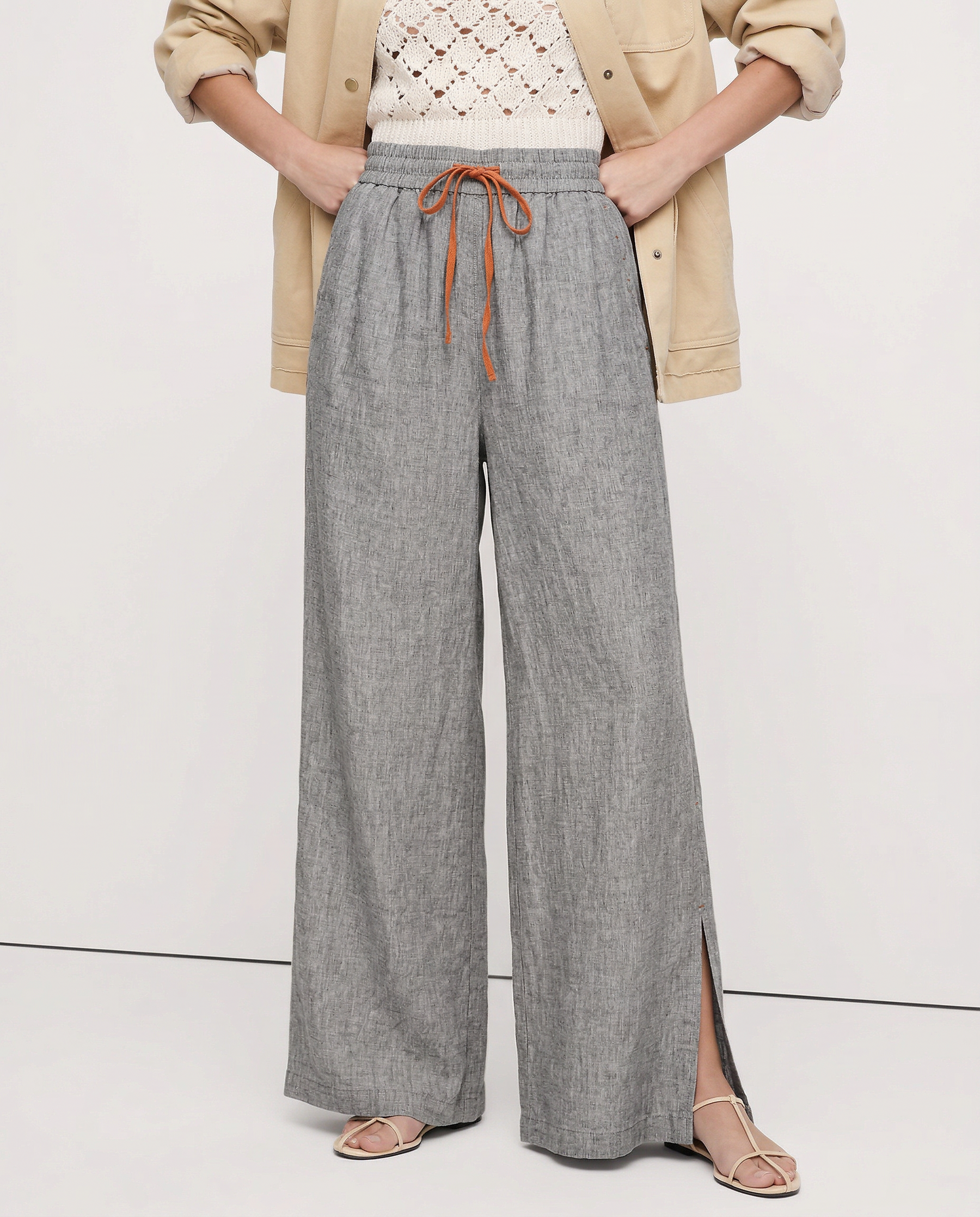 Women's linen wide-leg drawstring trousers with loose fit and high-quality fabric, perfect for casual and summer wear.