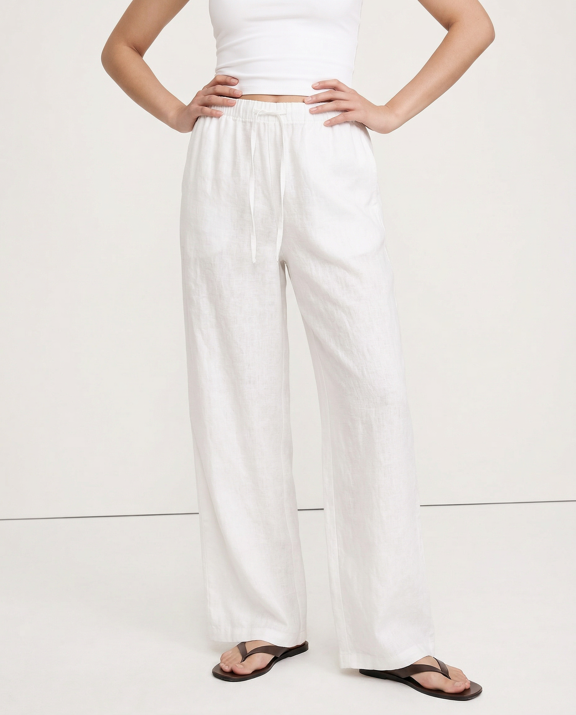 Knit wide-leg drawstring trousers for women, loose pull-on style, showcasing soft fabric and relaxed fit.