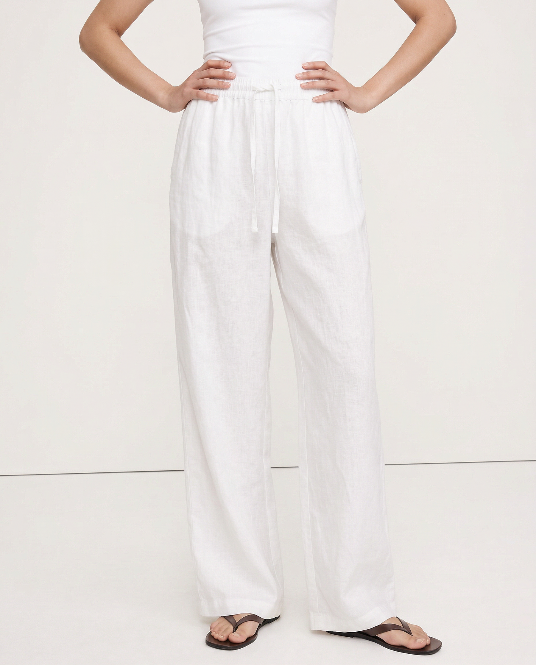 Knit wide-leg drawstring trousers for women, loose pull-on style, showcasing soft fabric and relaxed fit.