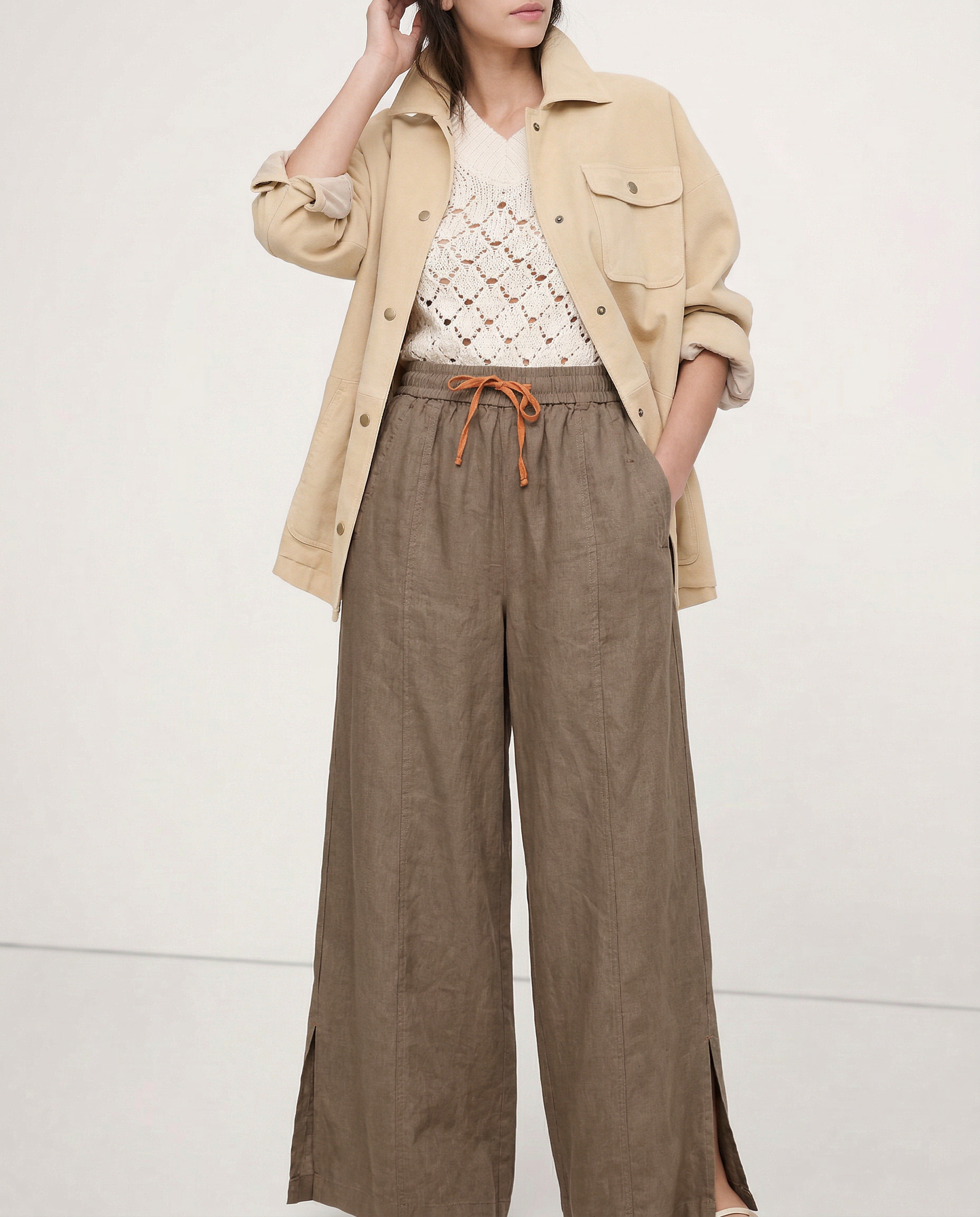 Women's linen wide-leg drawstring trousers from My Store, featuring loose fit and breathable fabric, shown on a hanger.