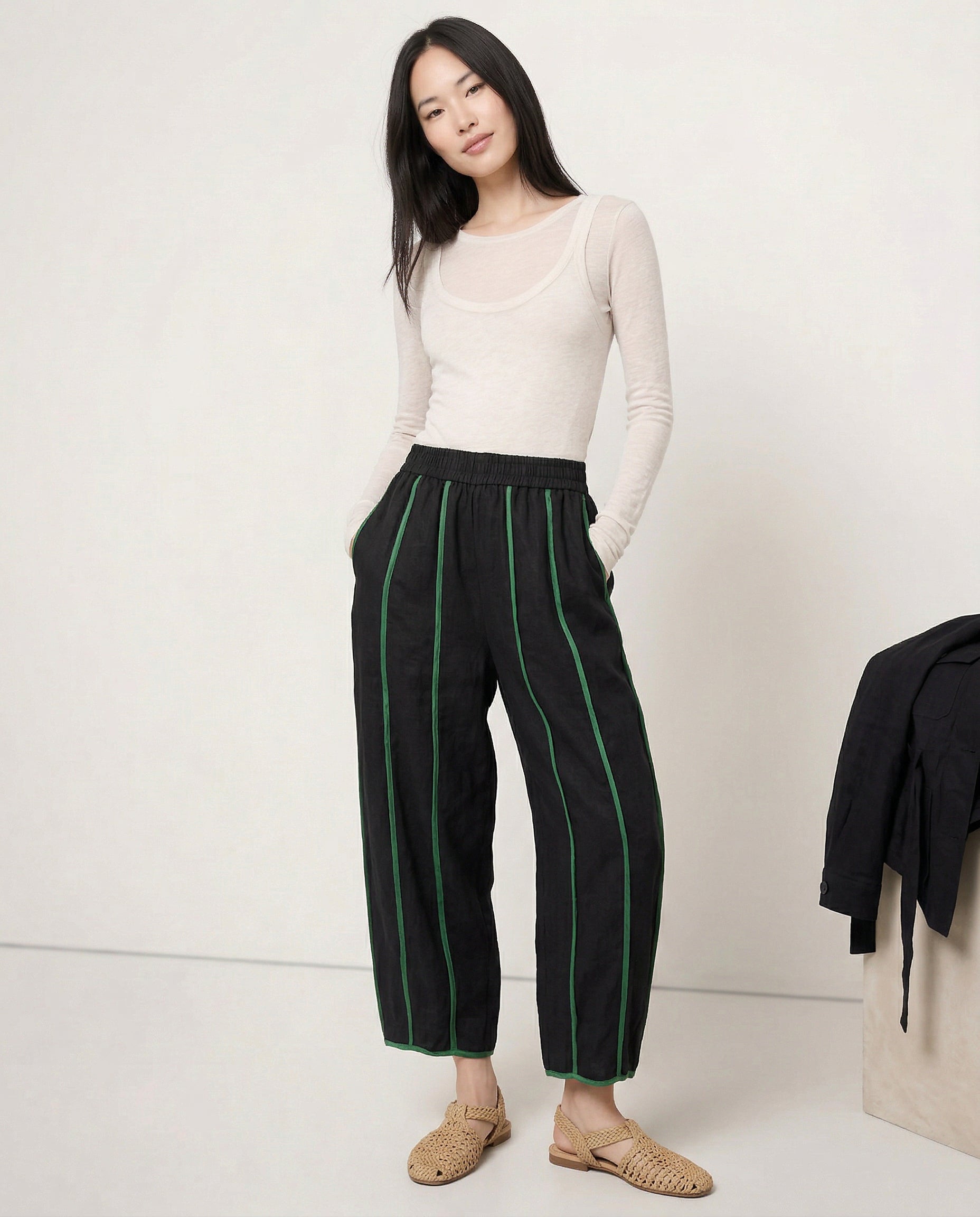 Linen wide-leg elastic-waist trousers for women, showing soft, textured fabric and relaxed fit, ideal for comfortable, stylish wear.