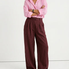 Women’s high-waist linen blend wide-leg trousers, pull-on style, showing soft, textured fabric and relaxed fit in natural light.