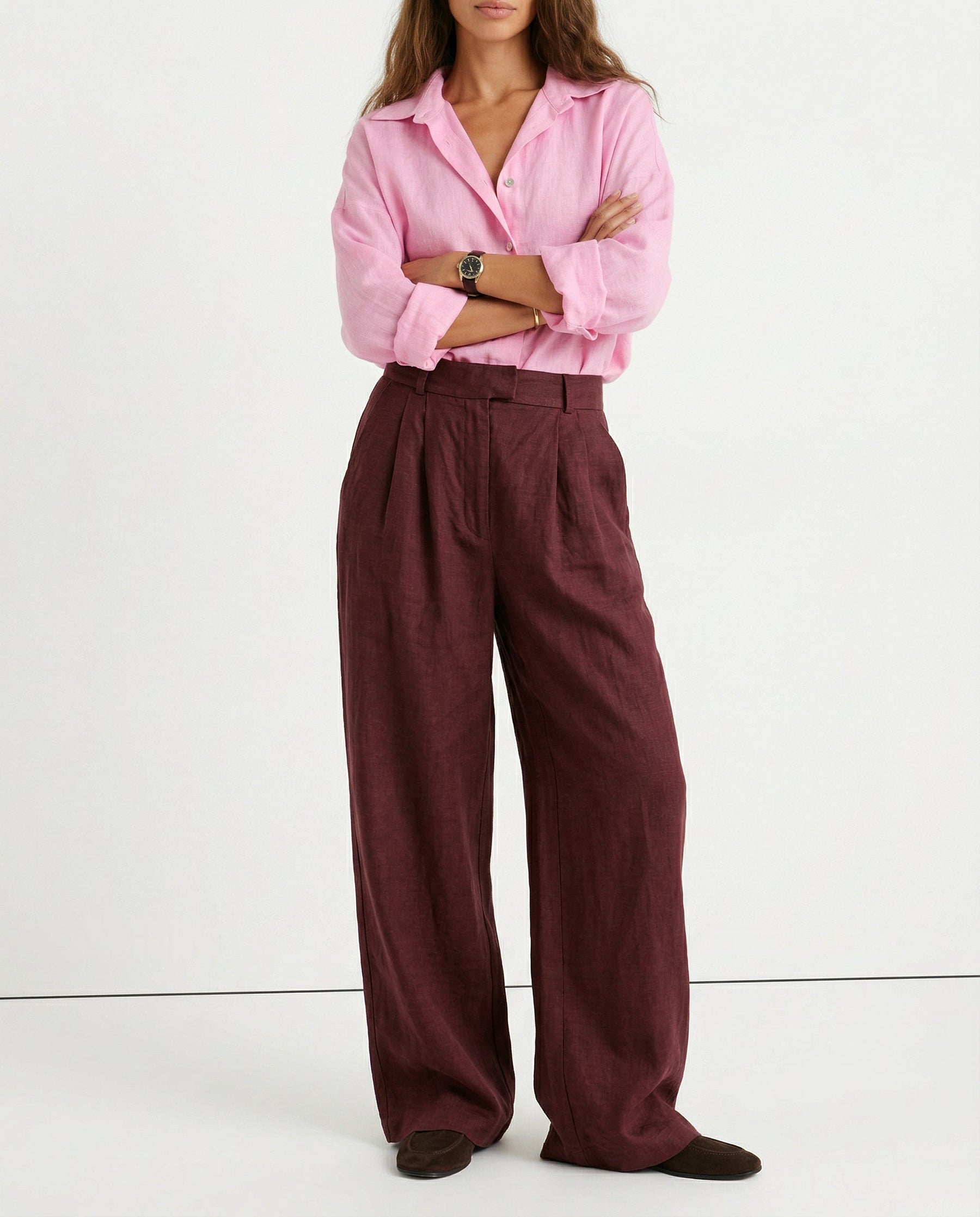 Women’s high-waist linen blend wide-leg trousers, pull-on style, showing soft, textured fabric and relaxed fit in natural light.