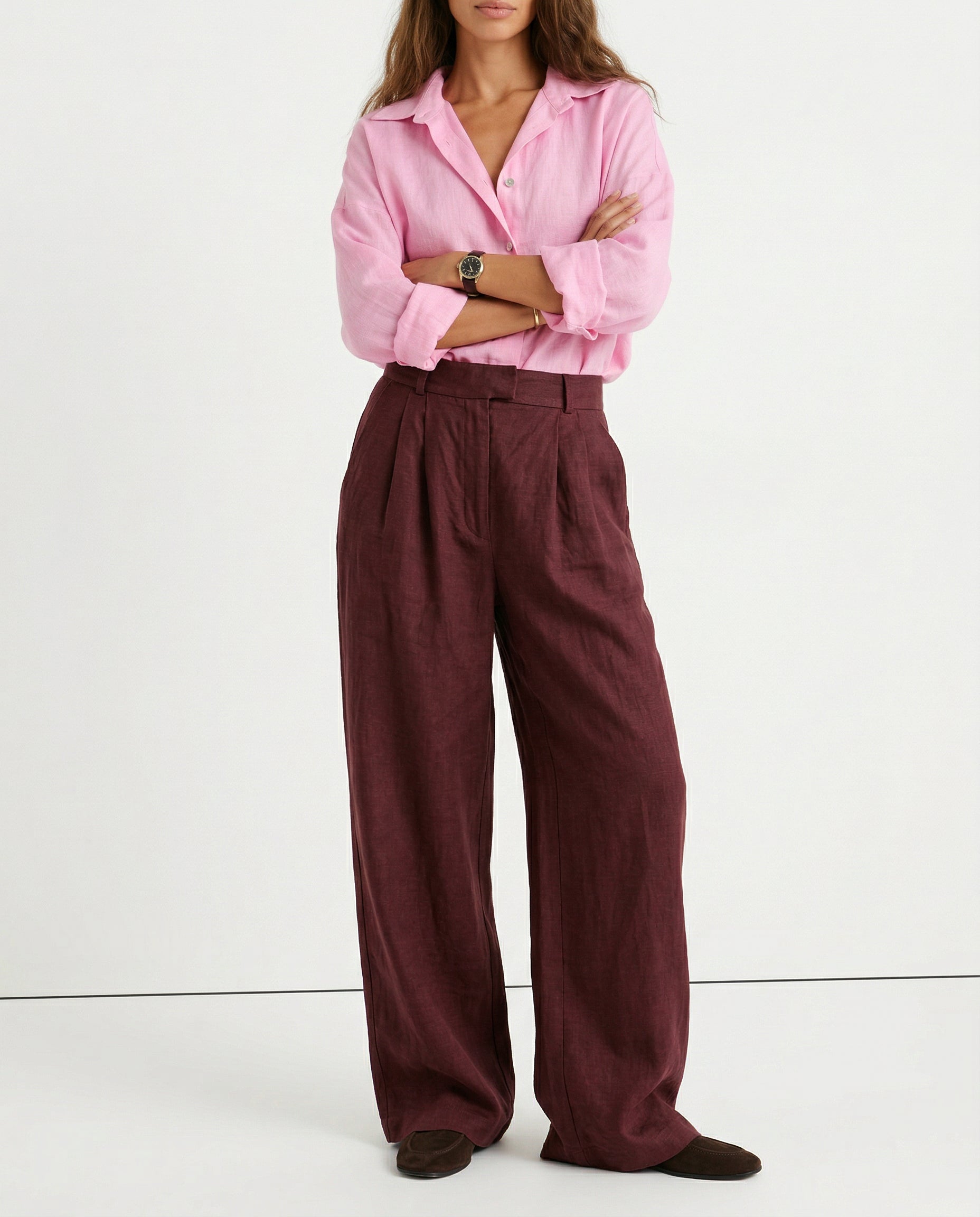 Women’s high-waist linen blend wide-leg trousers, pull-on style, showing soft, textured fabric and relaxed fit in natural light.