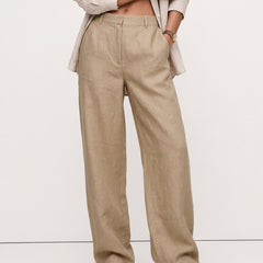 Women's high-waist linen blend wide-leg trousers with a loose pull-on design, showcasing the soft, high-quality fabric.