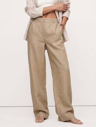 Women's high-waist linen blend wide-leg trousers with a loose pull-on design, showcasing the soft, high-quality fabric.