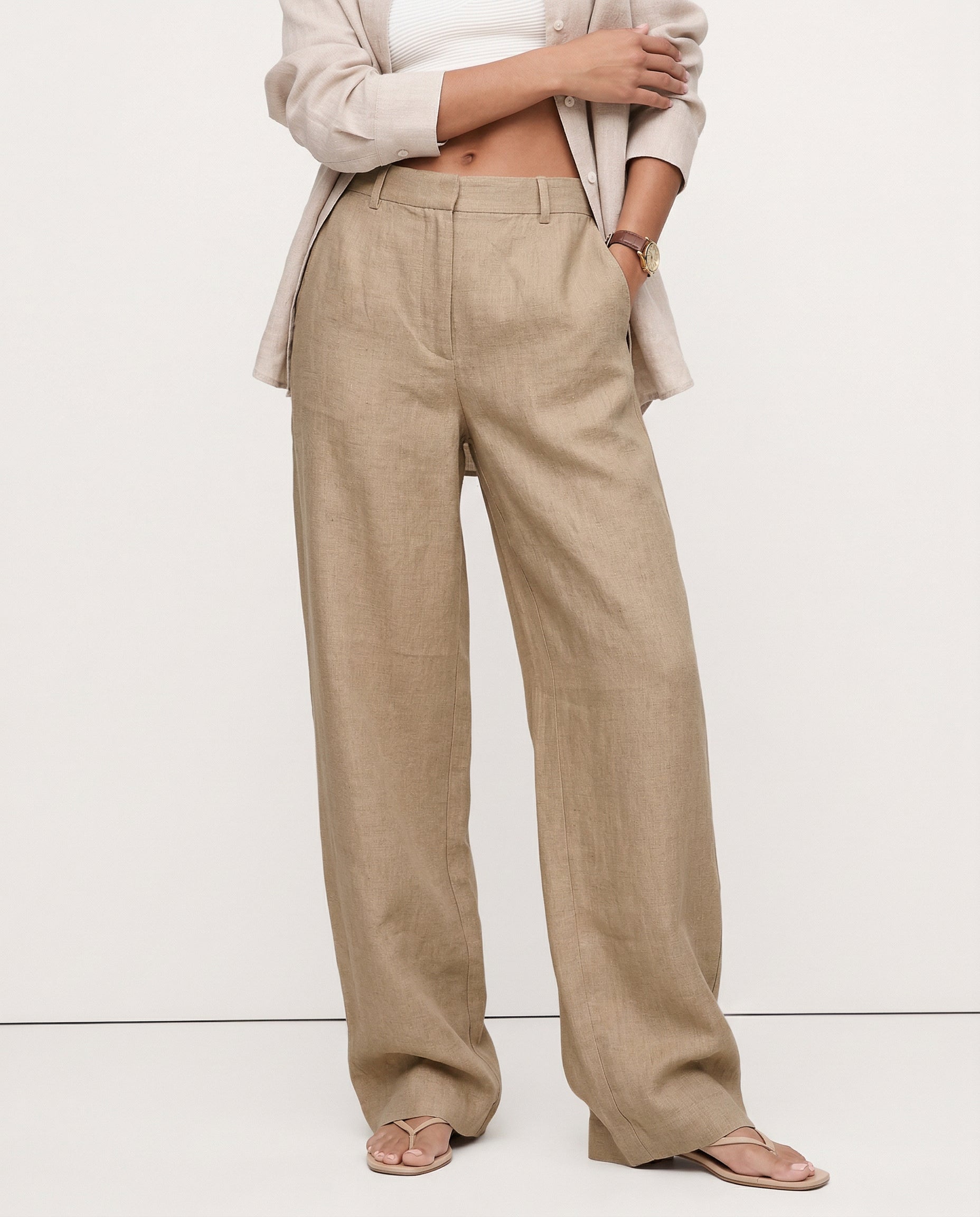 Women's high-waist linen blend wide-leg trousers with a loose pull-on design, showcasing the soft, high-quality fabric.