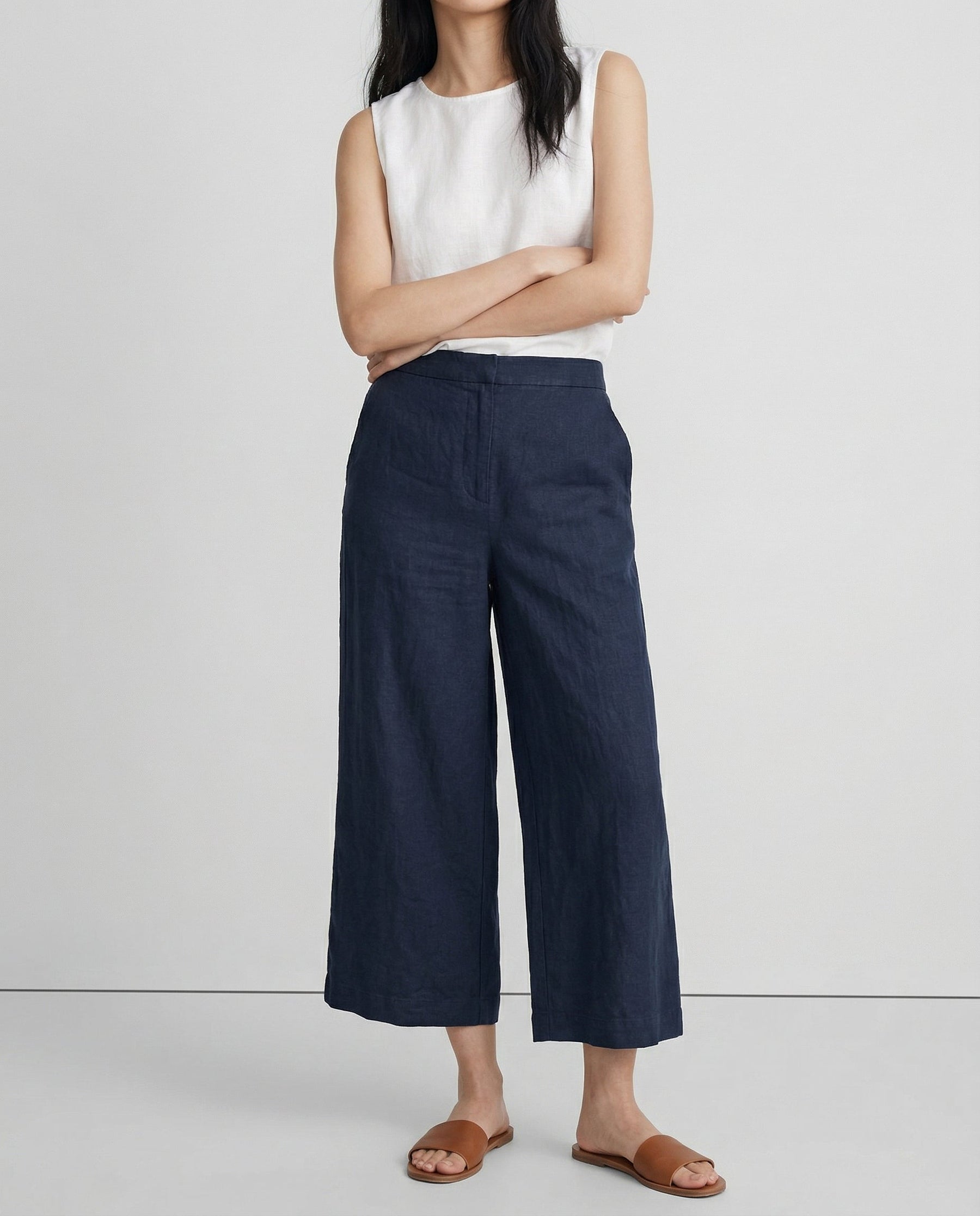 Linen cropped wide-leg drawstring trousers for women, showcasing breathable fabric and relaxed fit, styled for casual wear.