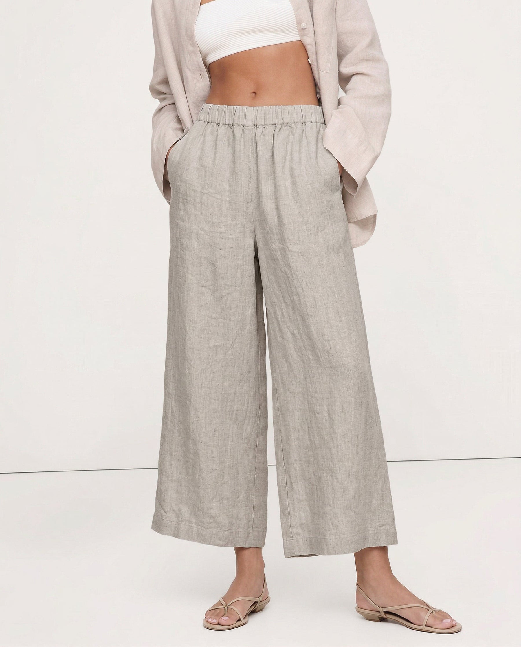 Linen cropped wide-leg drawstring trousers for women, showing the high-quality, breathable linen fabric and relaxed fit.