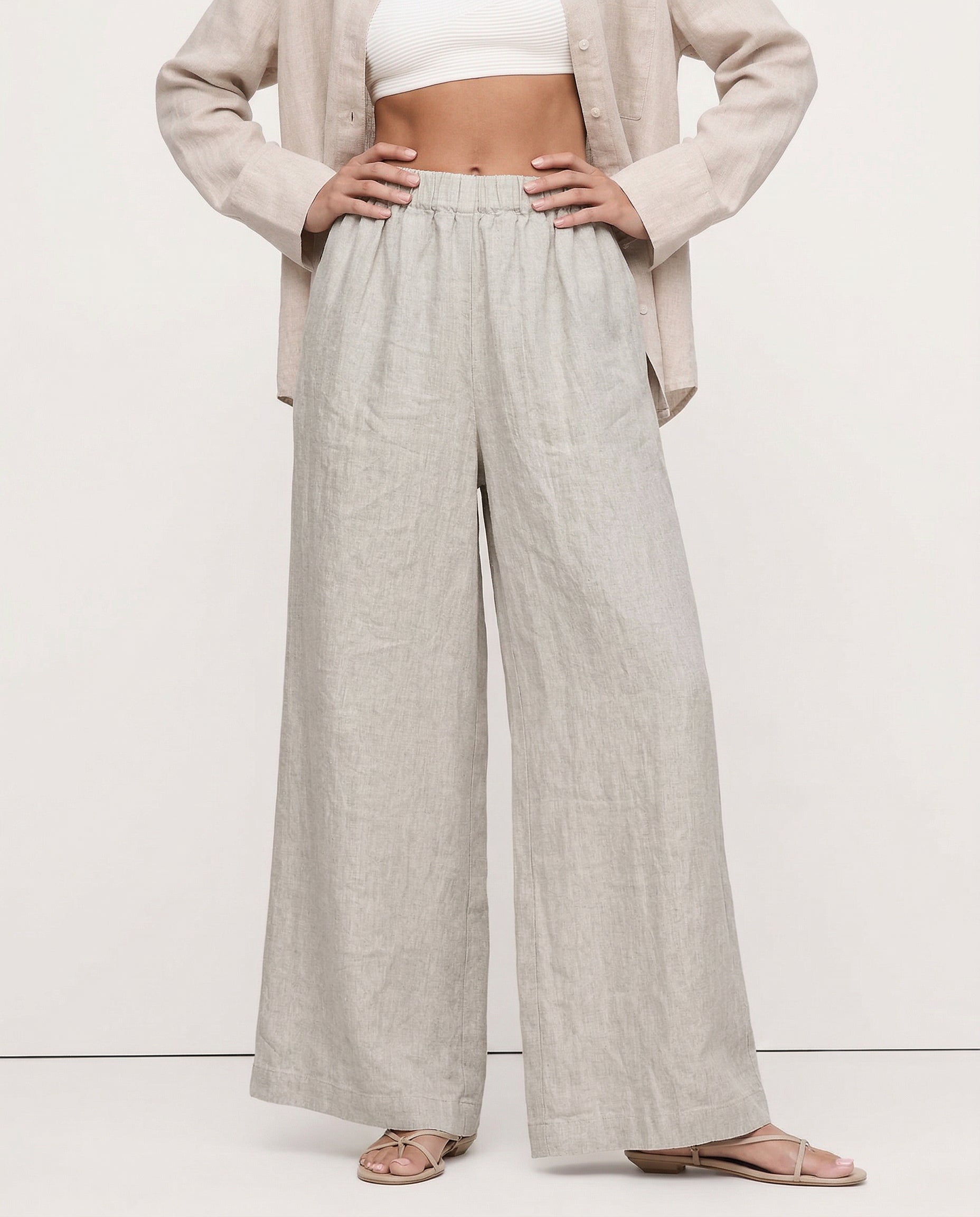 Linen cropped wide-leg drawstring trousers for women, featuring a loose fit and high-quality fabric, styled for casual comfort.