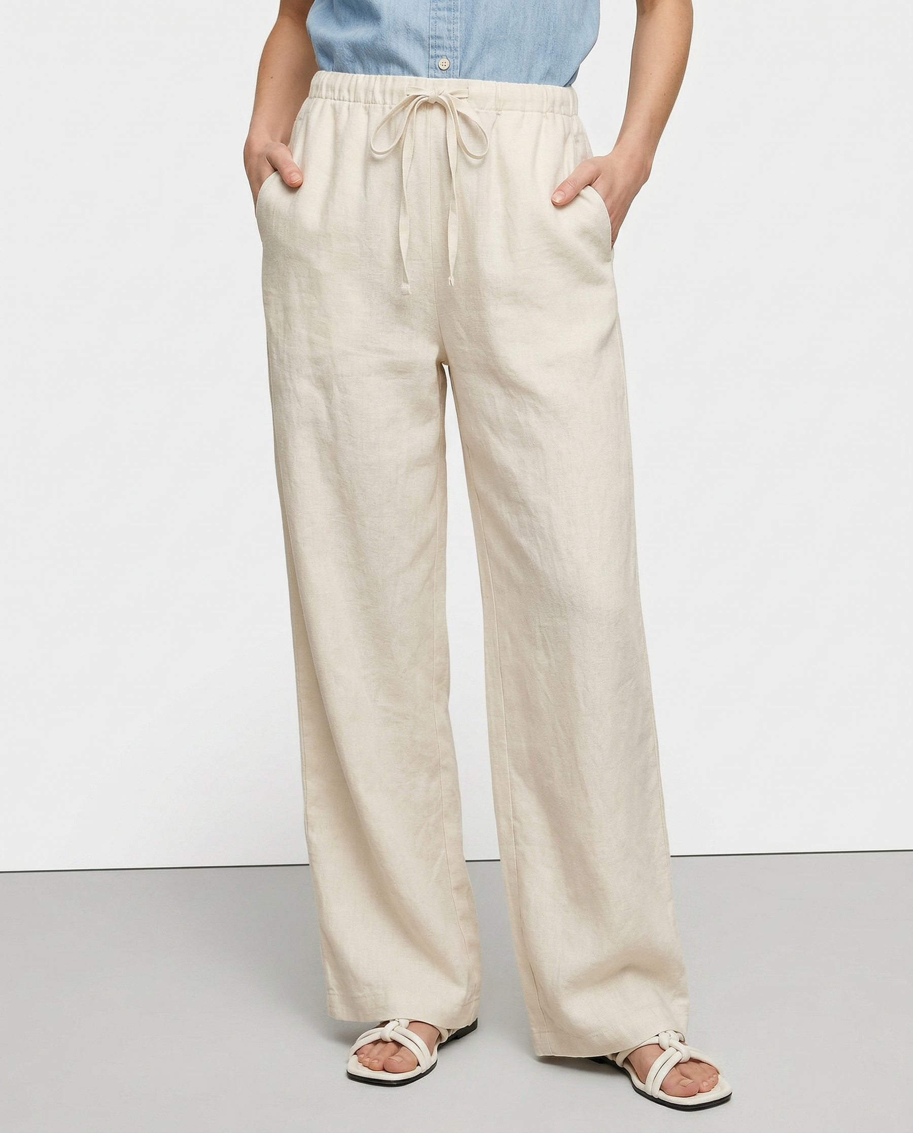 Knit wide-leg drawstring trousers for women, featuring soft fabric, loose fit, and pull-on style for comfortable everyday wear.