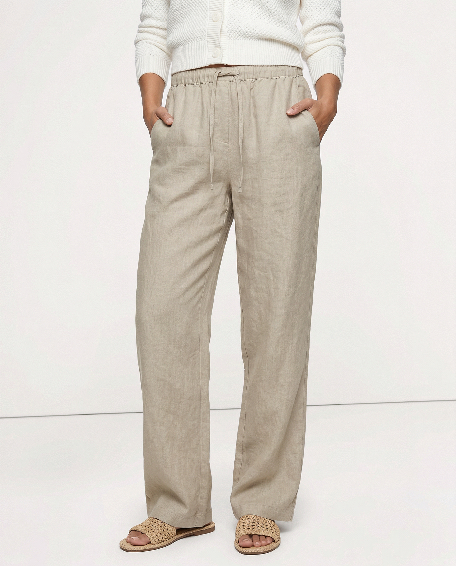 Women’s knit wide-leg drawstring trousers, loose pull-on pants with a relaxed fit and comfortable waistband, worn by a model.