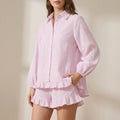 Front view of Tammy Bradley women's striped ruffle two-piece co-ord set, featuring a stylish crop top and matching high-waisted skirt.