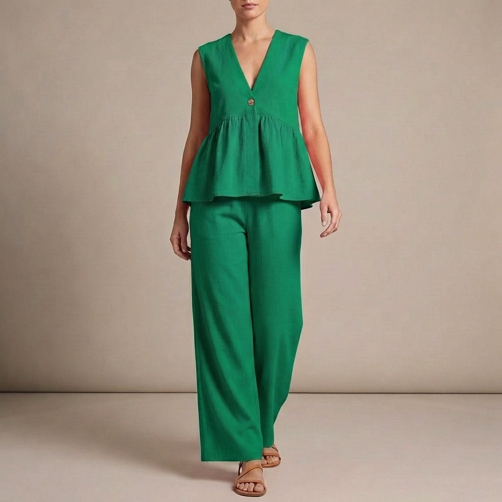 Green women's V-neck wide-leg two-piece set by Tammy Bradley, featuring a stylish coordinated top and matching wide-leg pants.