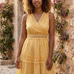 Lace tiered maxi dress with V-neck and flowy skirt, featuring intricate lace details and a relaxed fit, worn by a model.