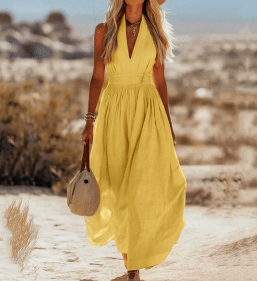 Sleeveless cotton maxi dress for women by Tammy Bradley, flowing design with a relaxed fit and vibrant floral pattern.