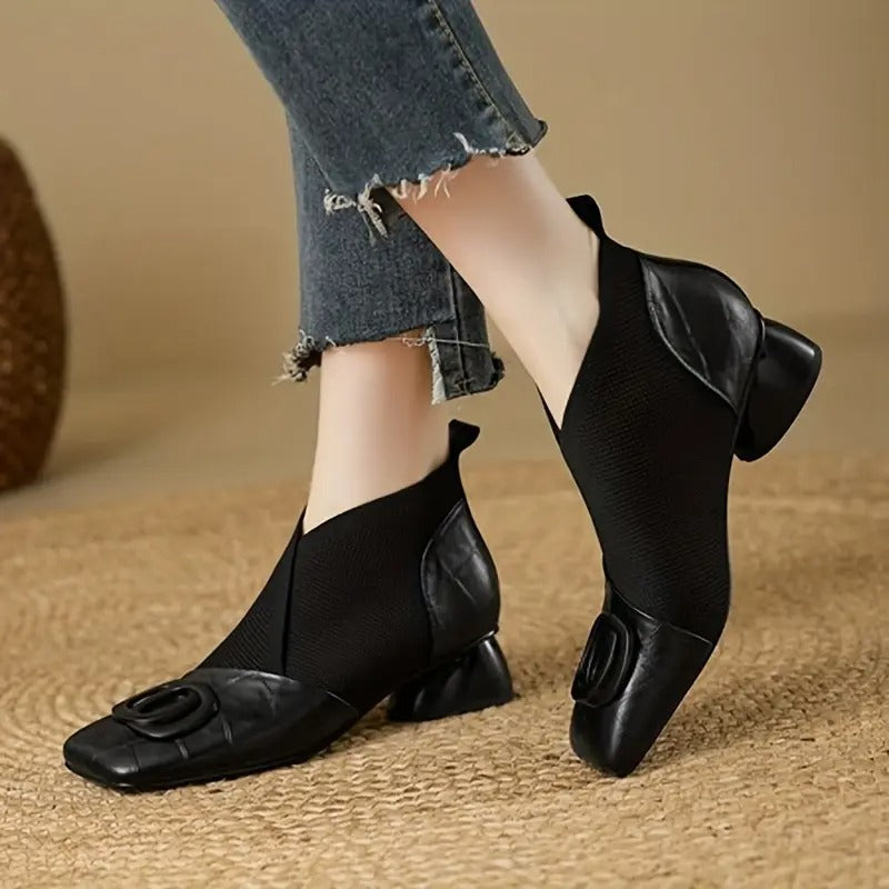 Women's orthopedic ankle boots with heels and non-slip soles, stylish and supportive footwear for comfortable walking.