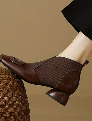 Orthopedic ankle boots for women with a heel and non-slip sole, stylishly designed for comfort and support.