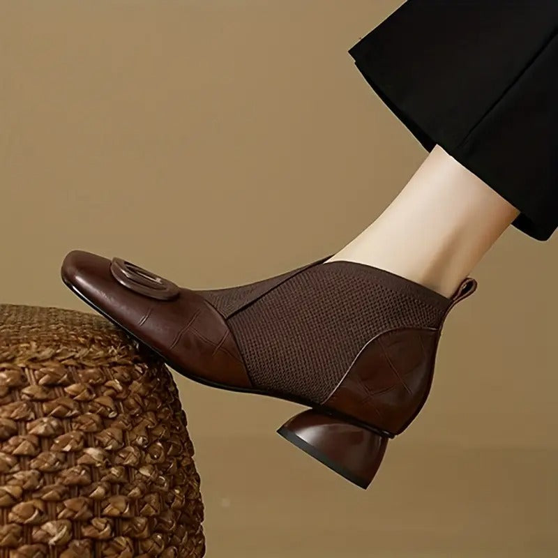 Orthopedic ankle boots for women with a heel and non-slip sole, stylishly designed for comfort and support.