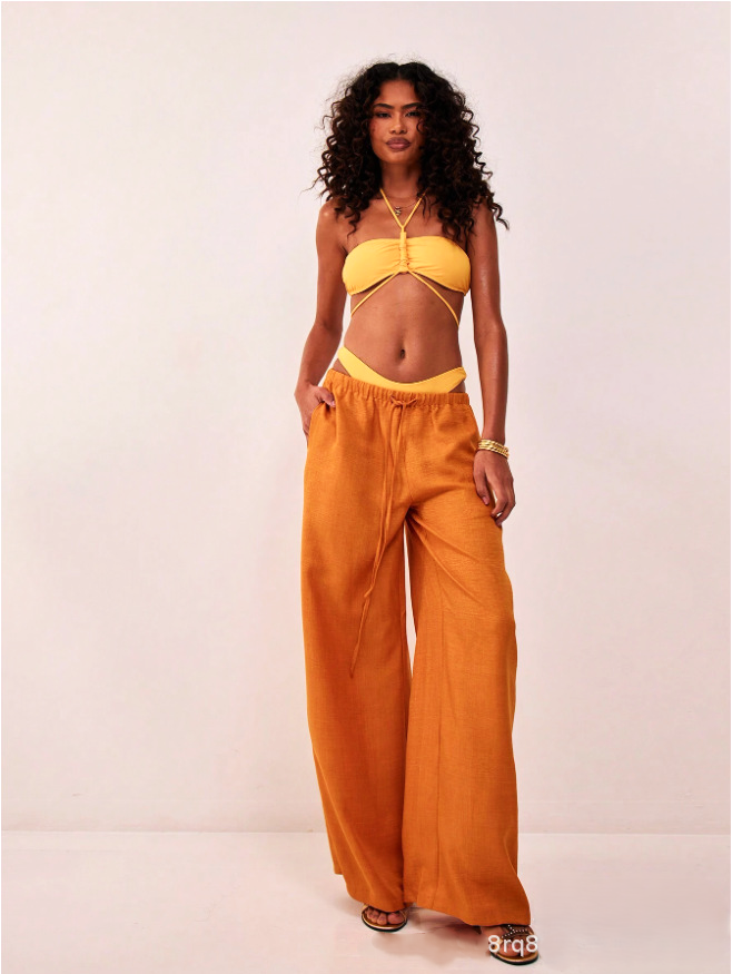 Linen-blend wide-leg women's trousers, loose pull-on pants, in natural fabric, styled for a relaxed, comfortable fit.