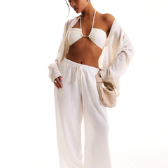 Linen-blend wide-leg women's trousers, loose pull-on pants in neutral fabric, styled for a relaxed, comfortable fit.