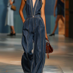 Dark blue denim sleeveless V-neck wide-leg jumpsuit for women, featuring stylish wide-leg pants and a fitted V-neck top.