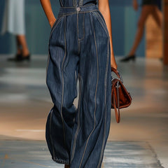Dark blue denim women's sleeveless jumpsuit with V-neck and wide-leg pants, featuring a stylish and comfortable fit.