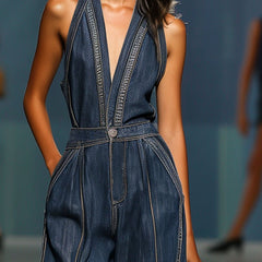 Dark blue denim women's jumpsuit with a V-neck, sleeveless design, and wide-leg pants style.