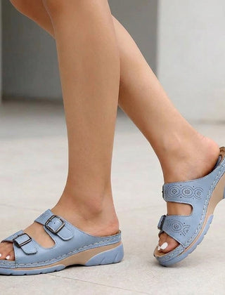 Light blue Tammy Bradley buckle platform slide sandals for women, featuring a comfortable slip-on design and stylish chunky sole.