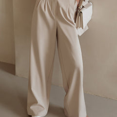 White wide-leg high-waist women's trousers with a relaxed fit, stylish and comfortable for casual or office wear.