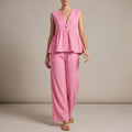 Pink women's V-neck wide-leg two-piece co-ord set by Tammy Bradley, featuring a fitted V-neck top and flowy wide-leg pants.