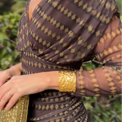 Bohemian patterned V-neck mesh maxi dress in a casual style, featuring flowing fabric and intricate design details.