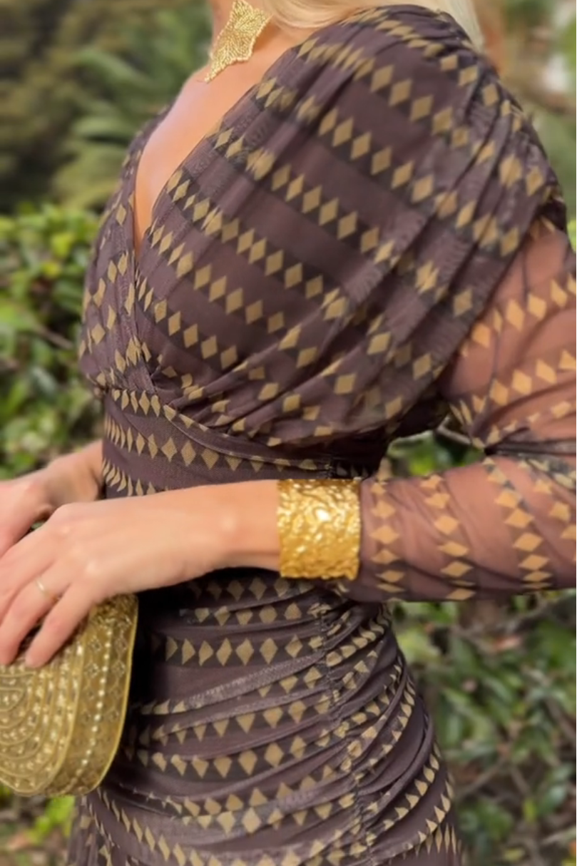 Bohemian patterned V-neck mesh maxi dress in a casual style, featuring flowing fabric and intricate design details.